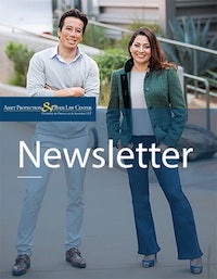 Newsletter cover with a man and a woman posing
